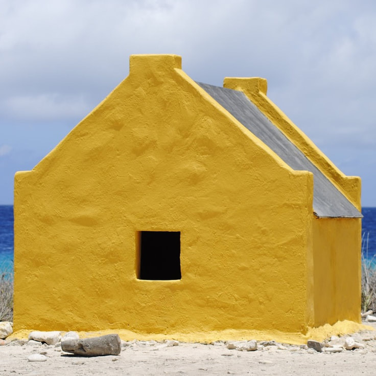 Another famous landmark are the red slave huts, although they are painted yellow